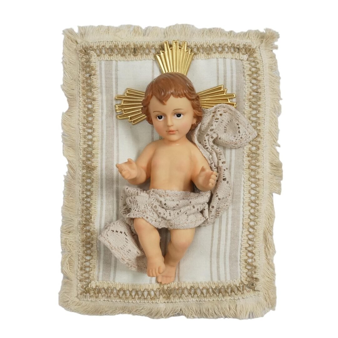 Bebé Jesús con cojín